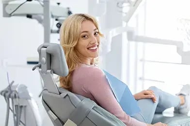 young-woman-smiling-during-exam-392x261